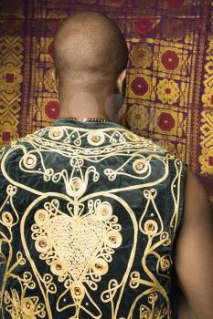 Royalty Free Photo of a Portrait of an African-American Man Wearing an Embroidered African Vest