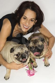 Royalty Free Photo of a Woman with two Pug dogs