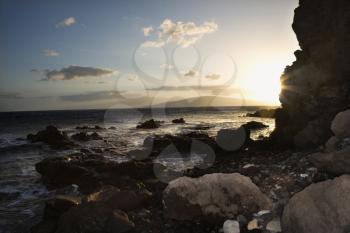 Royalty Free Photo of a Scenic Rocky Coast During a Sunset in Maui Hawaii