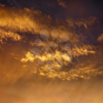 Royalty Free Photo of Golden Clouds in the Sky at Sunset