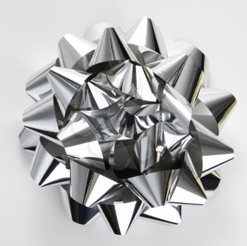 Royalty Free Photo of a Big Shiny Silver Christmas Bow