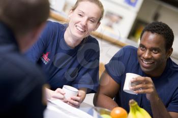 Royalty Free Photo of Firefighters in the Break Room