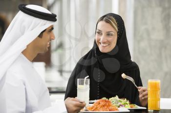 Royalty Free Photo of a Couple Eating