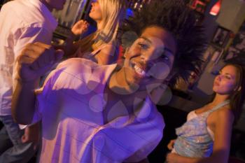 Royalty Free Photo of a Young Man at a Bar