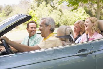 Royalty Free Photo of Two Couples in a Convertible