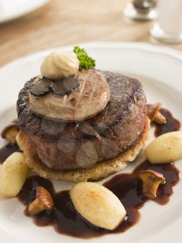 Royalty Free Photo of Tournedos Rossini With Cocotte Potatoes