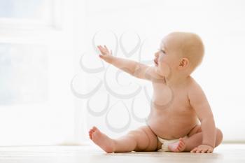 Royalty Free Photo of a Baby on the Floor