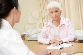 Royalty Free Photo of a Woman in a Doctor's Office