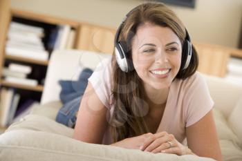 Royalty Free Photo of a Woman Listening to Music