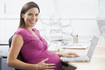 Royalty Free Photo of a Woman at a Laptop