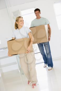 Royalty Free Photo of a Couple Moving In to a New Home