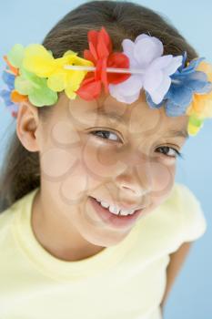 Royalty Free Photo of a Little Girl Wearing a Garland