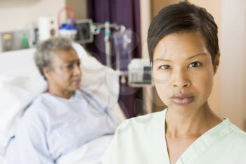 Royalty Free Photo of a Doctor in a Patient's Room