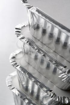 Royalty Free Photo of a Stack of Foil Containers