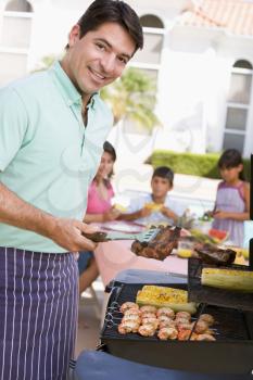 Royalty Free Photo of a Family Barbecue