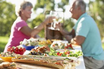 Royalty Free Photo of a Couple Dining Outside