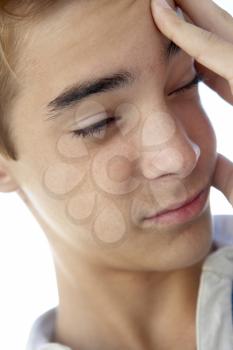 Royalty Free Photo of a Boy With a Headache