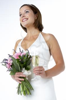 Royalty Free Photo of a Bride With a Glass of Wine