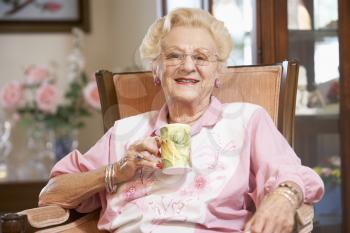 Royalty Free Photo of a Woman Drinking Tea