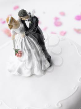 Royalty Free Photo of a Wedding Cake With Figurines