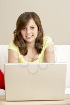 Royalty Free Photo of a Girl With a Laptop