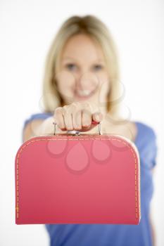 Royalty Free Photo of a Woman Holding a Suitcase