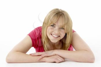 Studio Portrait Of Smiling Teenage Girl