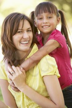 Portrait Of Mother And Daughter Together In Park