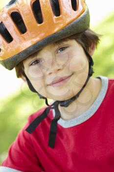 Boy wearing cycling helmet