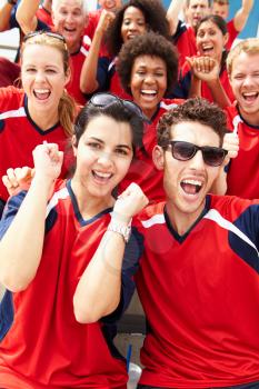 Spectators In Team Colors Watching Sports Event