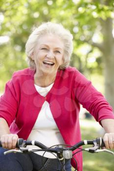 Senior woman riding bike