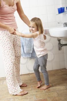 Mother And Daughter Having Fun In Bathroom