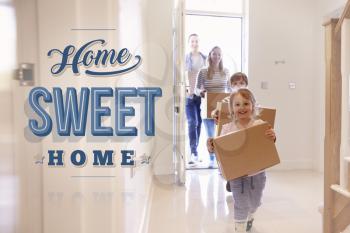 Family Carrying Boxes Into New Home Sweet Home