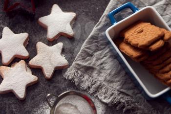 Freshly Baked Star Shaped Christmas Cookies On Board Dusted With Icing Sugar