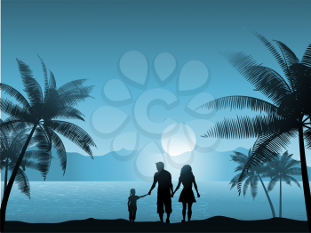 Family walking on the beach at night