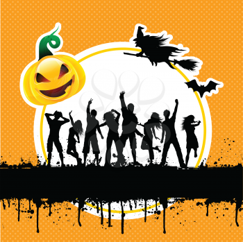 Silhouettes of people dancing on a grunge style Halloween background