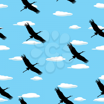 Seamless background with flying birds and clouds
