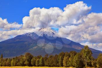 Famous volcano in South America - Osorno. At the top of the volcano is snow cap