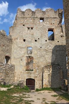 Dilapidated medieval fortress in the spring in Slovakia