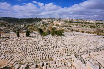 The ancient Jewish cemetery on the Mount of Olives. In the distance the neighborhoods of Jerusalem