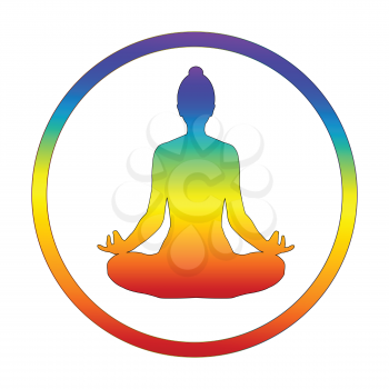 Silhouette of yogi in lotus position in chakra colors