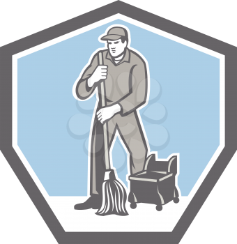 Illustration of a male cleaner janitor worker cleaning mopping floor viewed from front set inside shield crest on isolated background done in retro style.