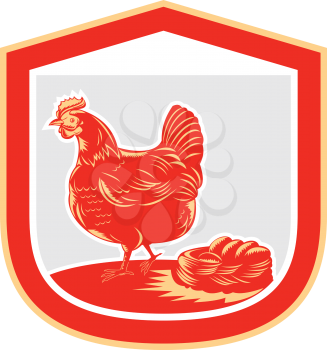 Illustration of a hen chicken side view with nest and eggs set inside shield crest done in retro woodcut style.