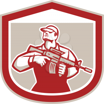 Illustration of an American soldier serviceman holding assault rifle looking up set inside shield crest on isolated background done in retro style. 