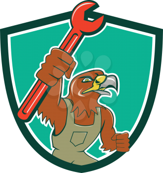 Illustration of a hawk mechanic raising up pipe spanner set inside shield crest on isolated background done in cartoon style. 