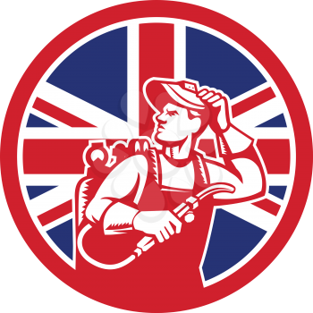 Icon retro style illustration of a British lit operator or welder with visor holding welding torch with United Kingdom UK, Great Britain Union Jack flag set inside circle on isolated background.