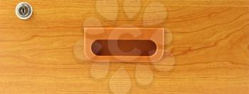 Royalty Free Photo of a Wooden Drawer With a Lock