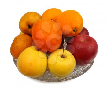 Various fruit in a glass vase on a white background, isolated