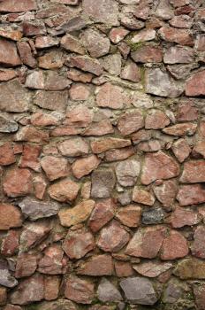 texture - the wall of the round rough stones