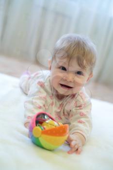 Baby Girl Playing with Smile Expression Indoors